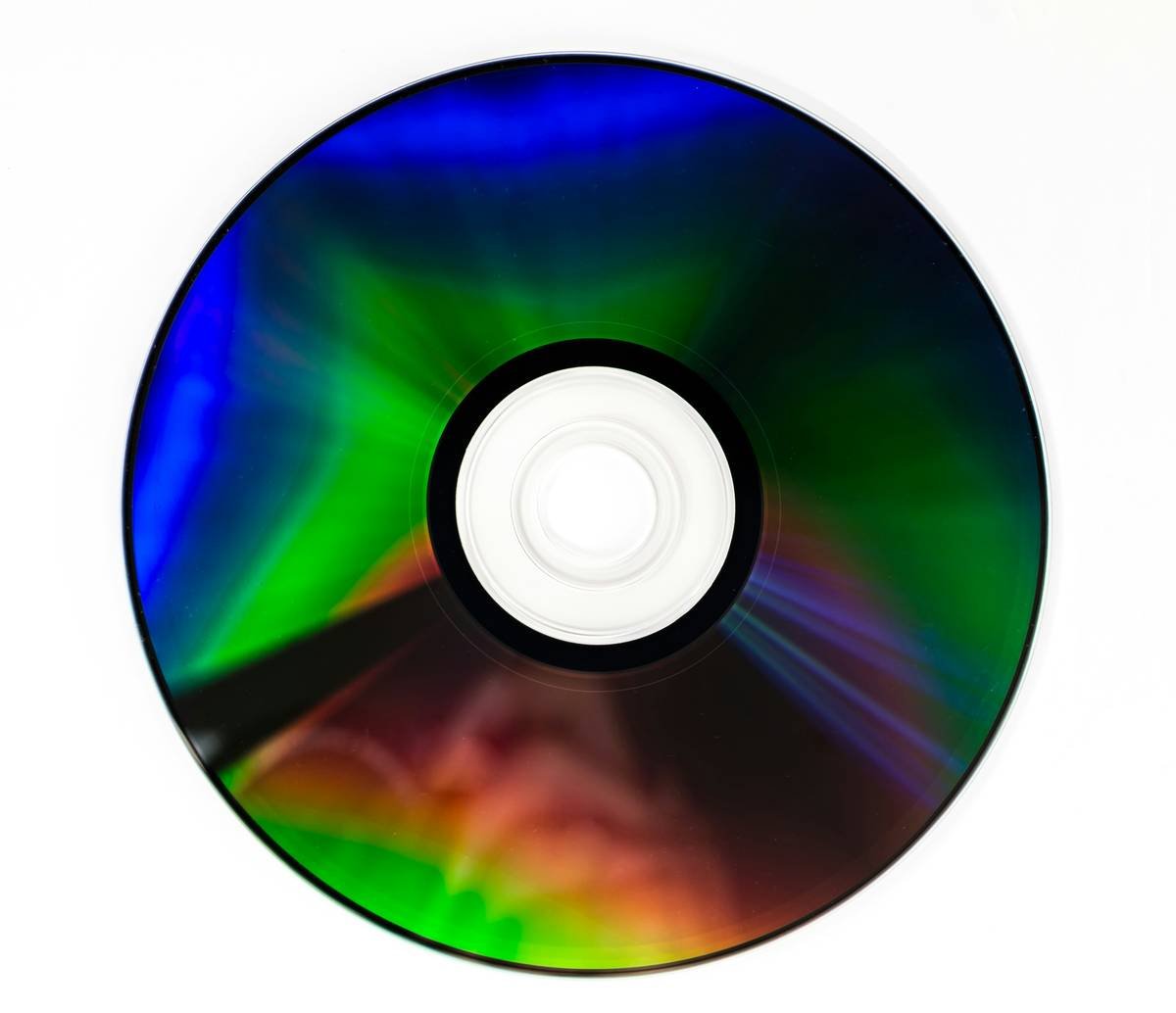 Side-by-side comparison: left shows metal-loaded abrasive disc with clogged surface; right shows cracked disc with visible fracture line—labeled 'UNSAFE TO REPAIR'
